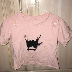 Cropped tee with stylish rips (not revealing)